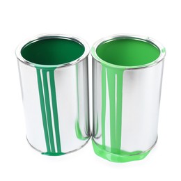 Photo of Cans of green paints isolated on white