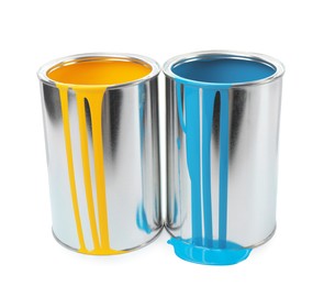 Photo of Cans of light blue and yellow paints isolated on white