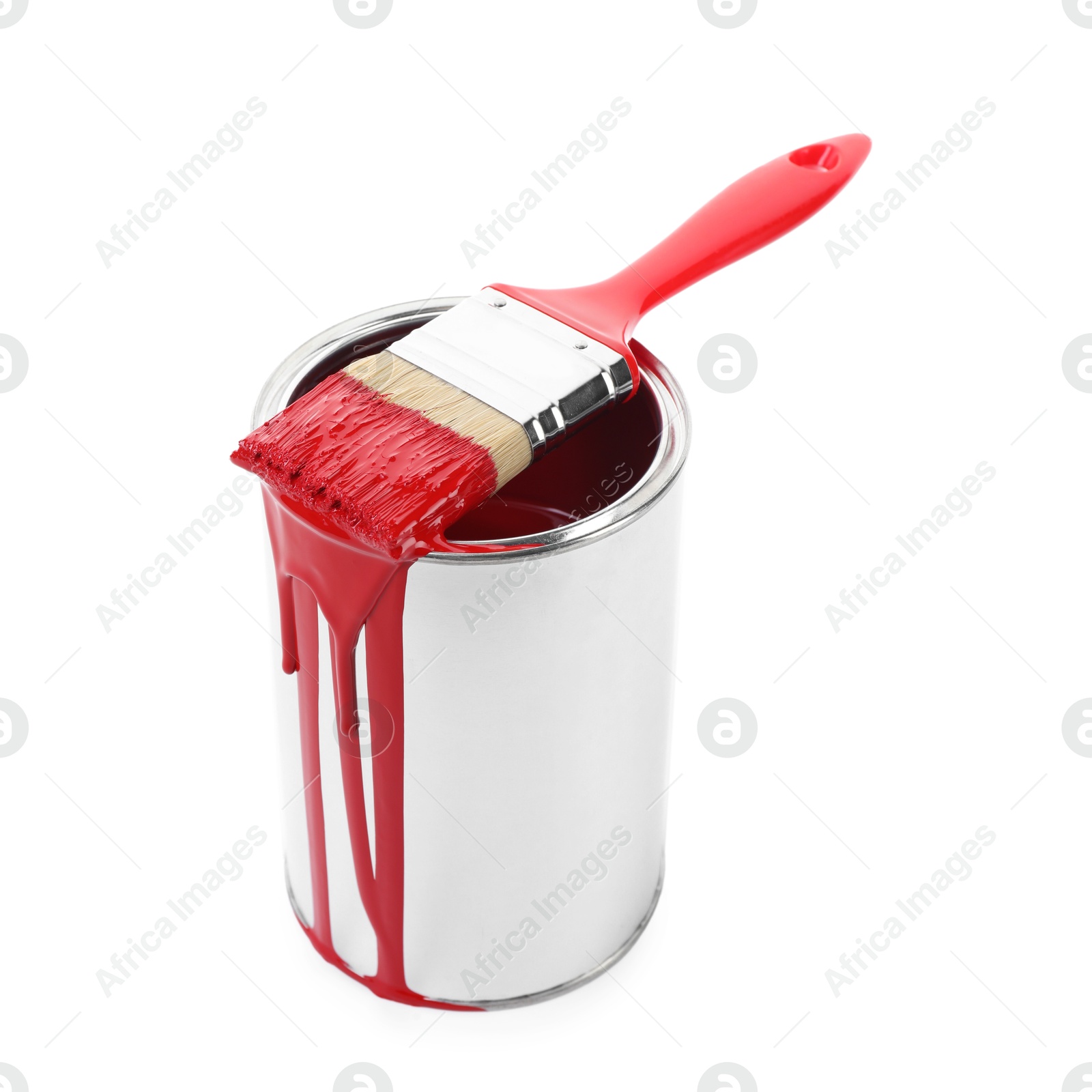 Photo of Can of red paint and brush isolated on white