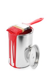 Photo of Can of red paint and brush isolated on white