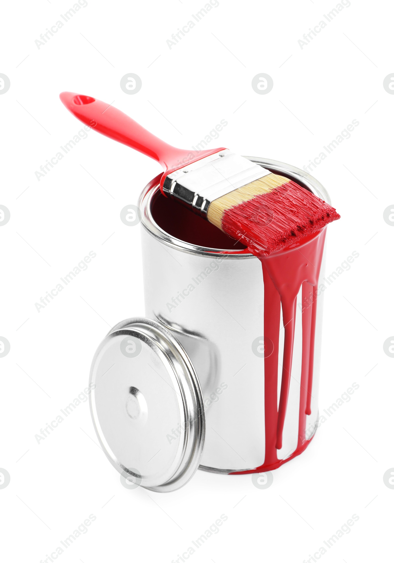 Photo of Can of red paint and brush isolated on white