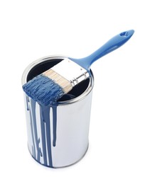 Photo of Can of blue paint and brush isolated on white