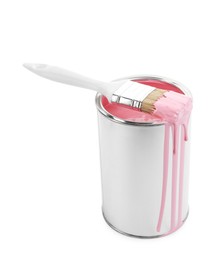 Photo of Can of pink paint and brush isolated on white