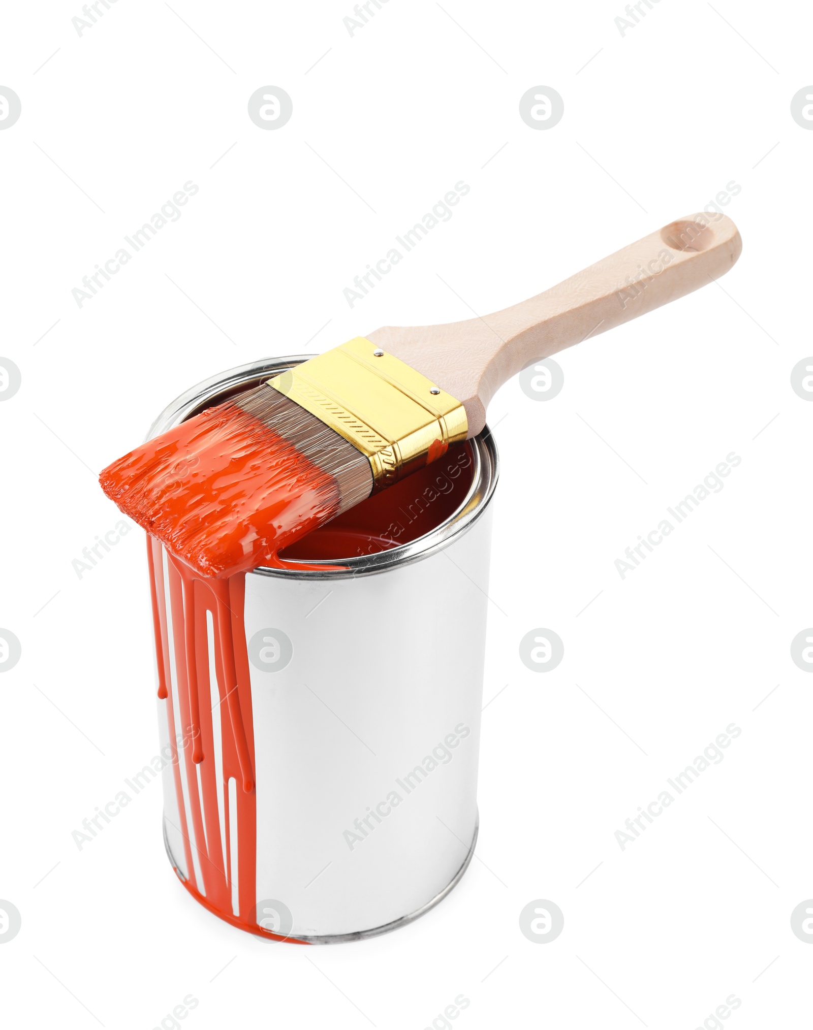 Photo of Can of orange paint and brush isolated on white