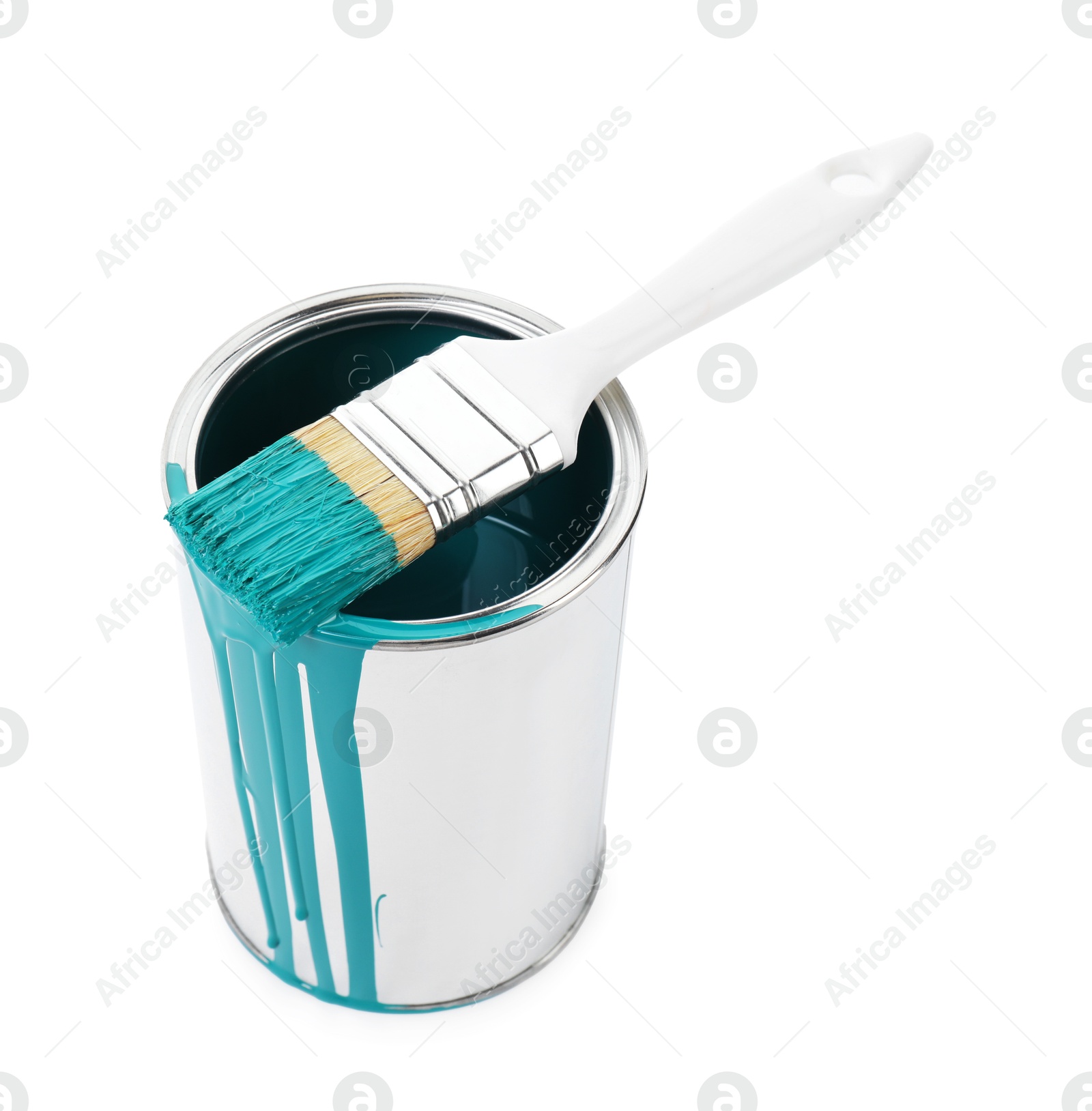 Photo of Can of turquoise paint and brush isolated on white