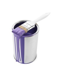 Can of violet paint and brush isolated on white