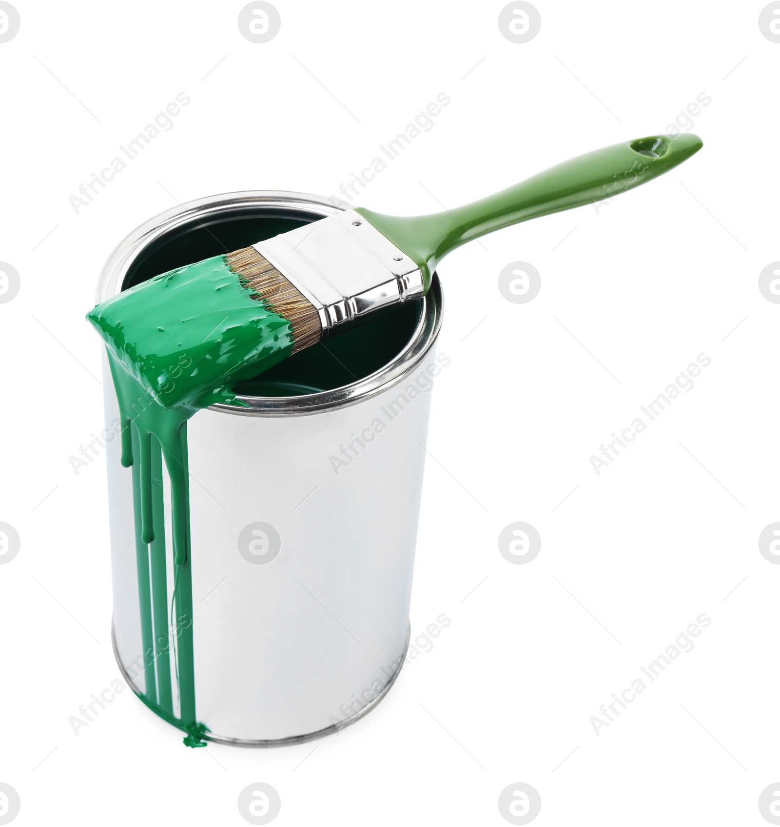 Photo of Can of green paint and brush isolated on white