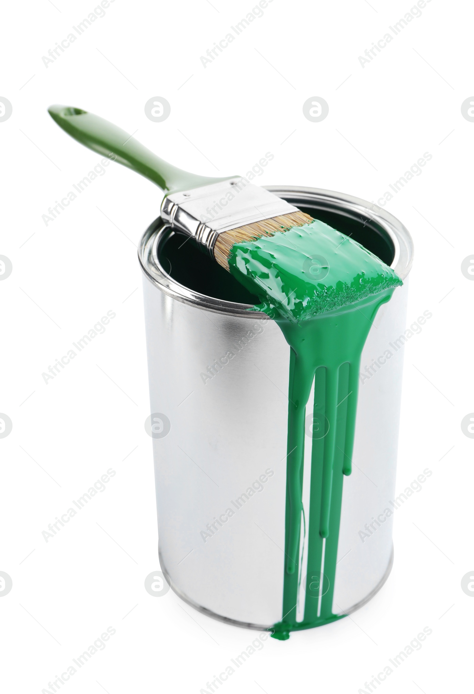 Photo of Can of green paint and brush isolated on white