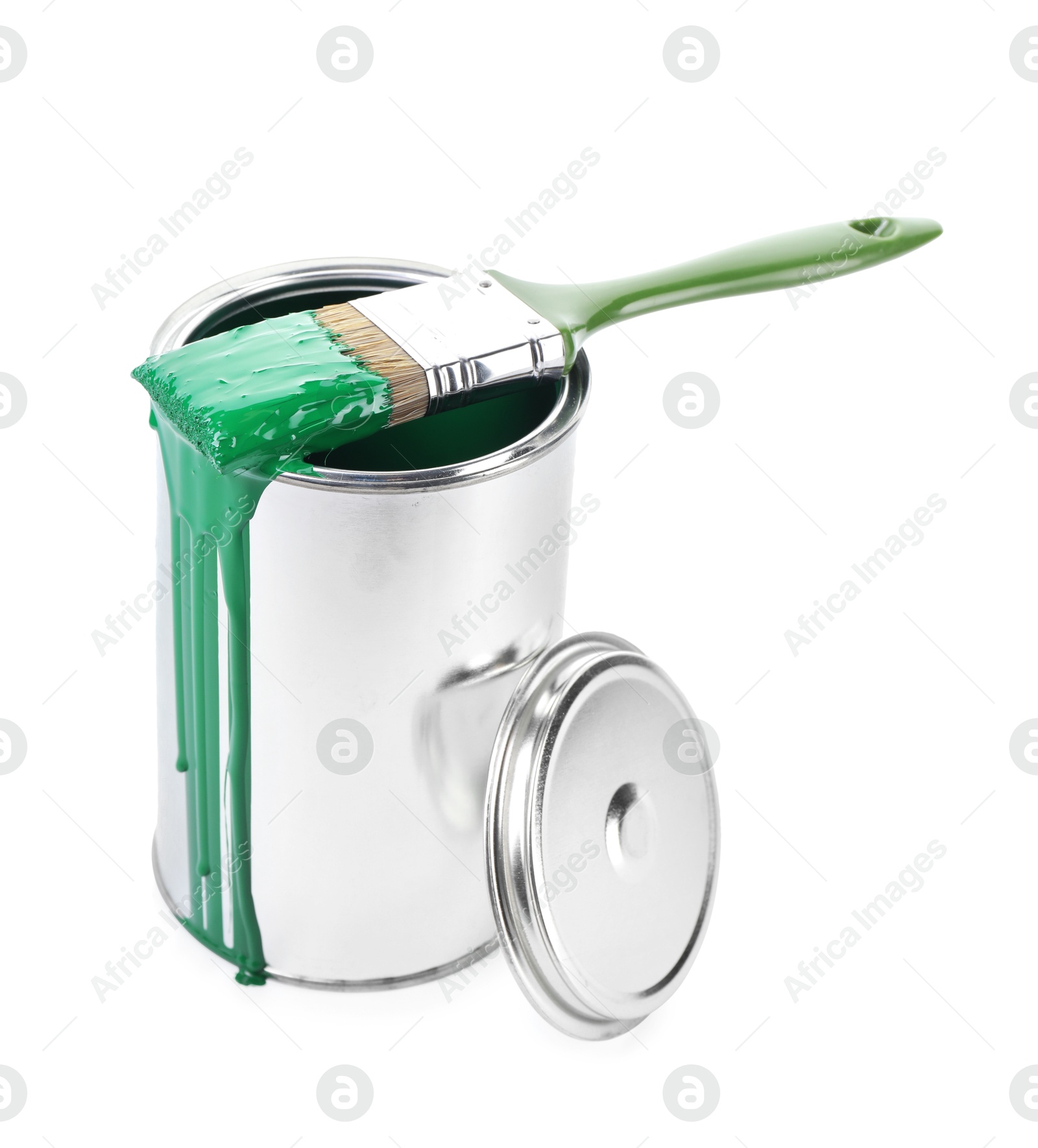 Photo of Can of green paint and brush isolated on white