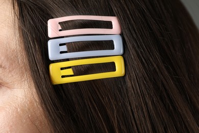 Woman with beautiful hair clips, closeup view