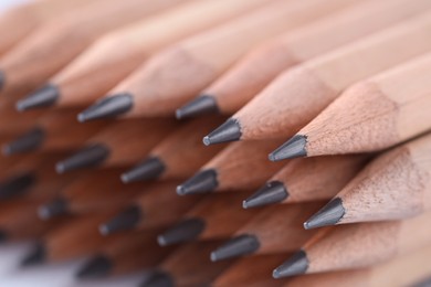 Many graphite pencils as background, closeup view