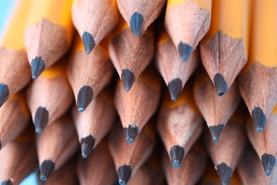 Photo of Many graphite pencils as background, closeup view