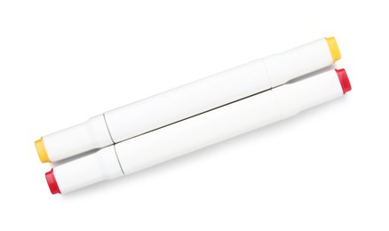 Photo of Double-sided marker pens on white background, top view