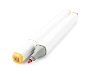 Photo of Two double-sided marker pens on white background