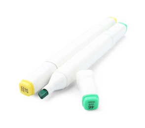 Photo of Two double-sided marker pens on white background