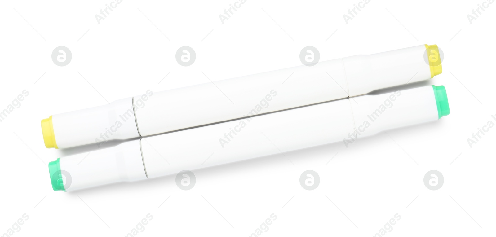 Photo of Double-sided marker pens on white background, top view