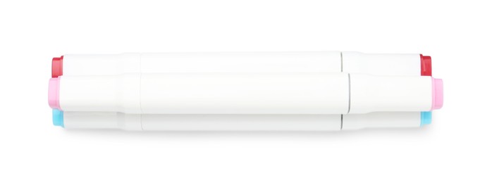 Photo of Double-sided marker pens on white background, top view