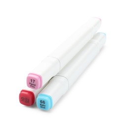 Photo of Many double-sided marker pens on white background