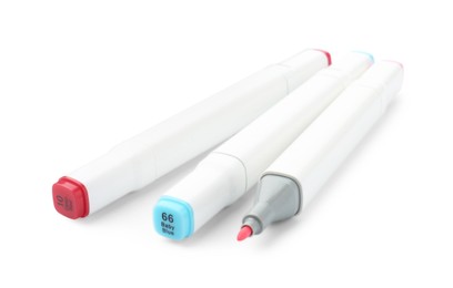 Photo of Many double-sided marker pens on white background