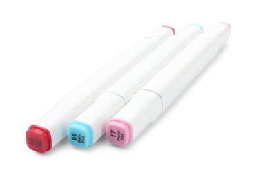 Photo of Many double-sided marker pens on white background