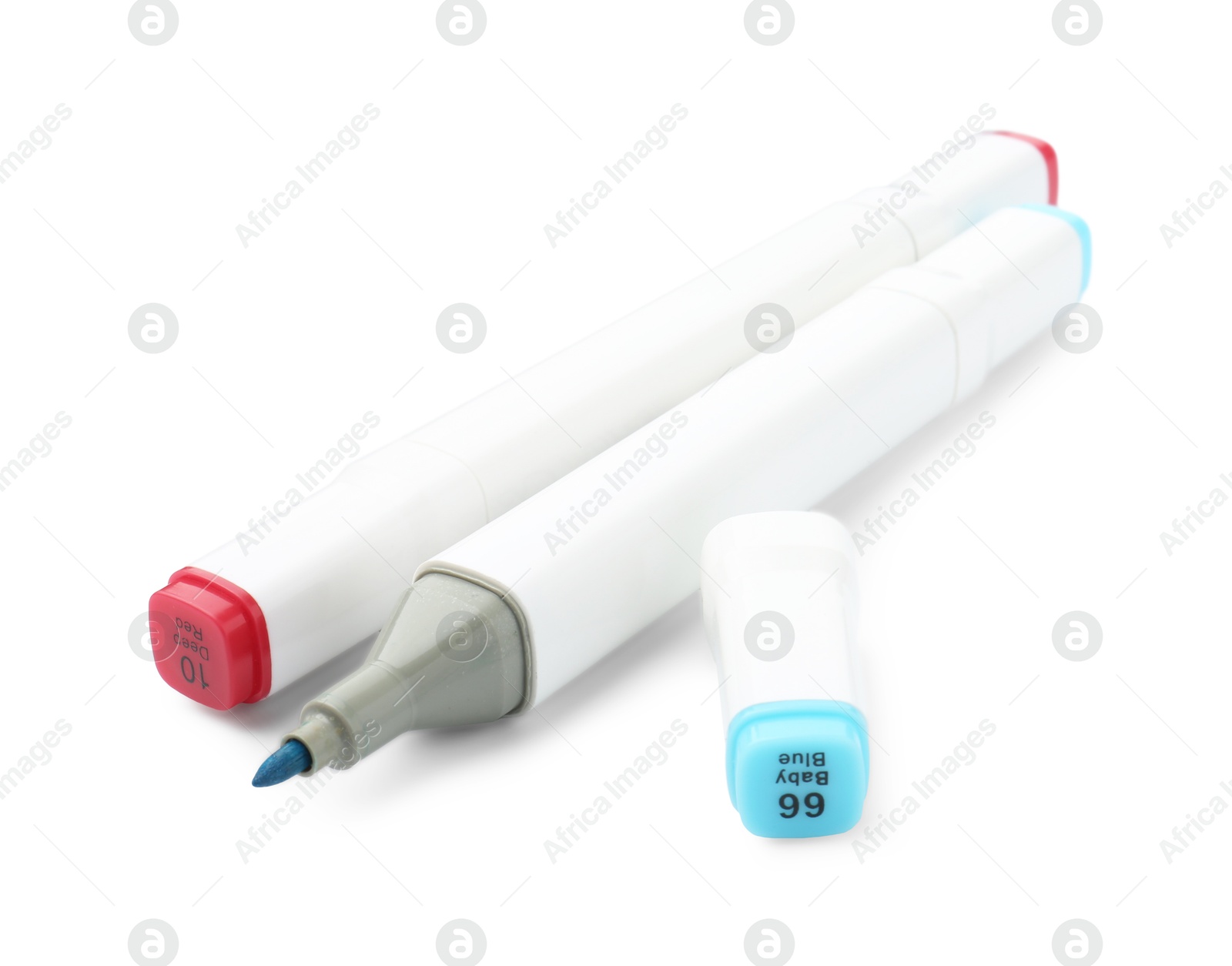 Photo of Two double-sided marker pens on white background