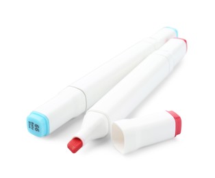 Photo of Two double-sided marker pens on white background