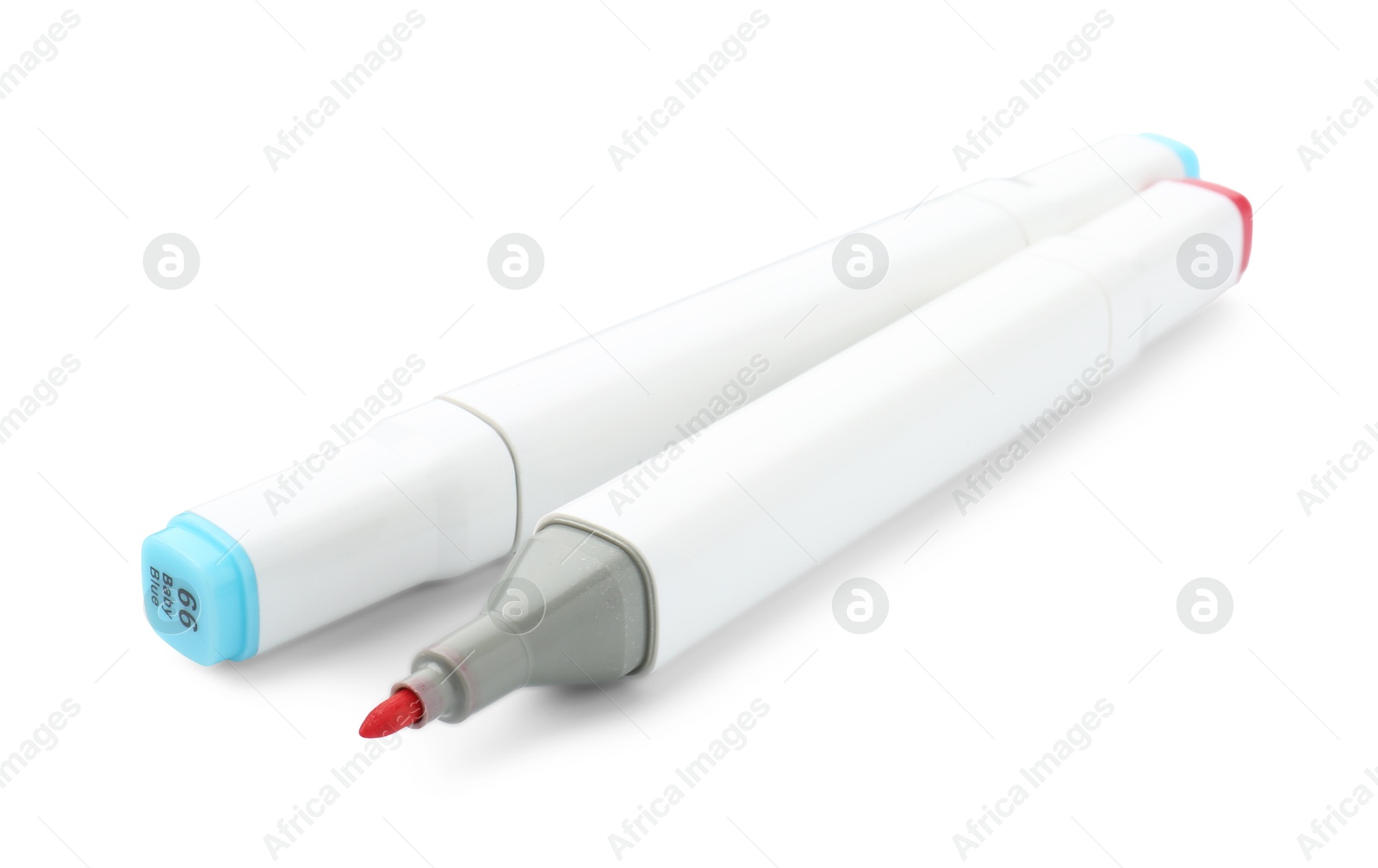 Photo of Two double-sided marker pens on white background