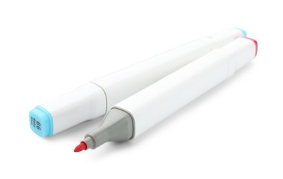 Photo of Two double-sided marker pens on white background