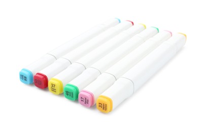 Photo of Many double-sided marker pens on white background