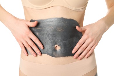 Photo of Woman doing spa body wraps on her belly against white background, closeup