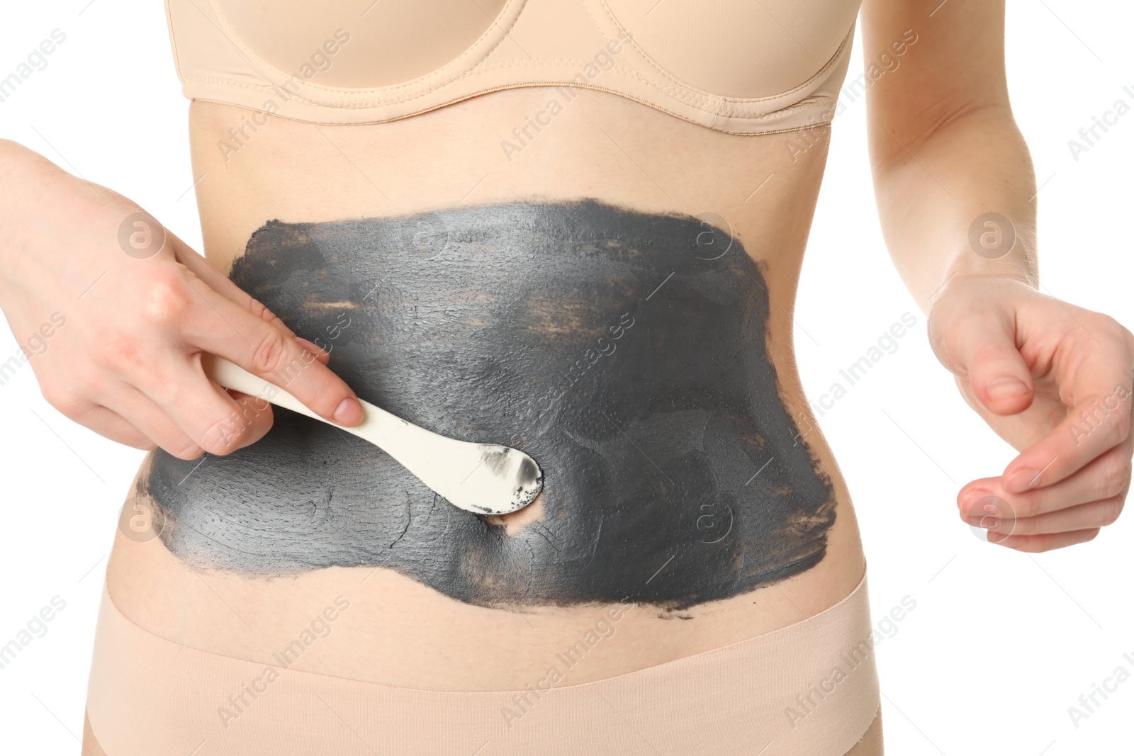 Photo of Woman applying cosmetic product for spa body wraps onto her belly against white background, closeup