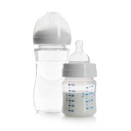 Photo of Feeding bottles with milk and water isolated on white