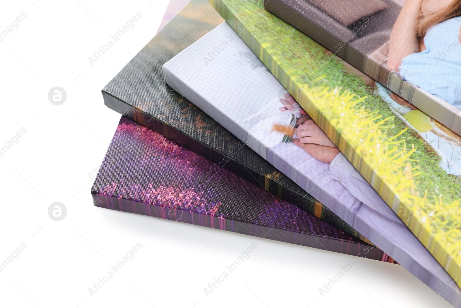 Photo of Canvas with different printed photos isolated on white