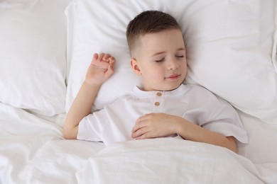 Bedtime. Cute boy sleeping in comfortable bed