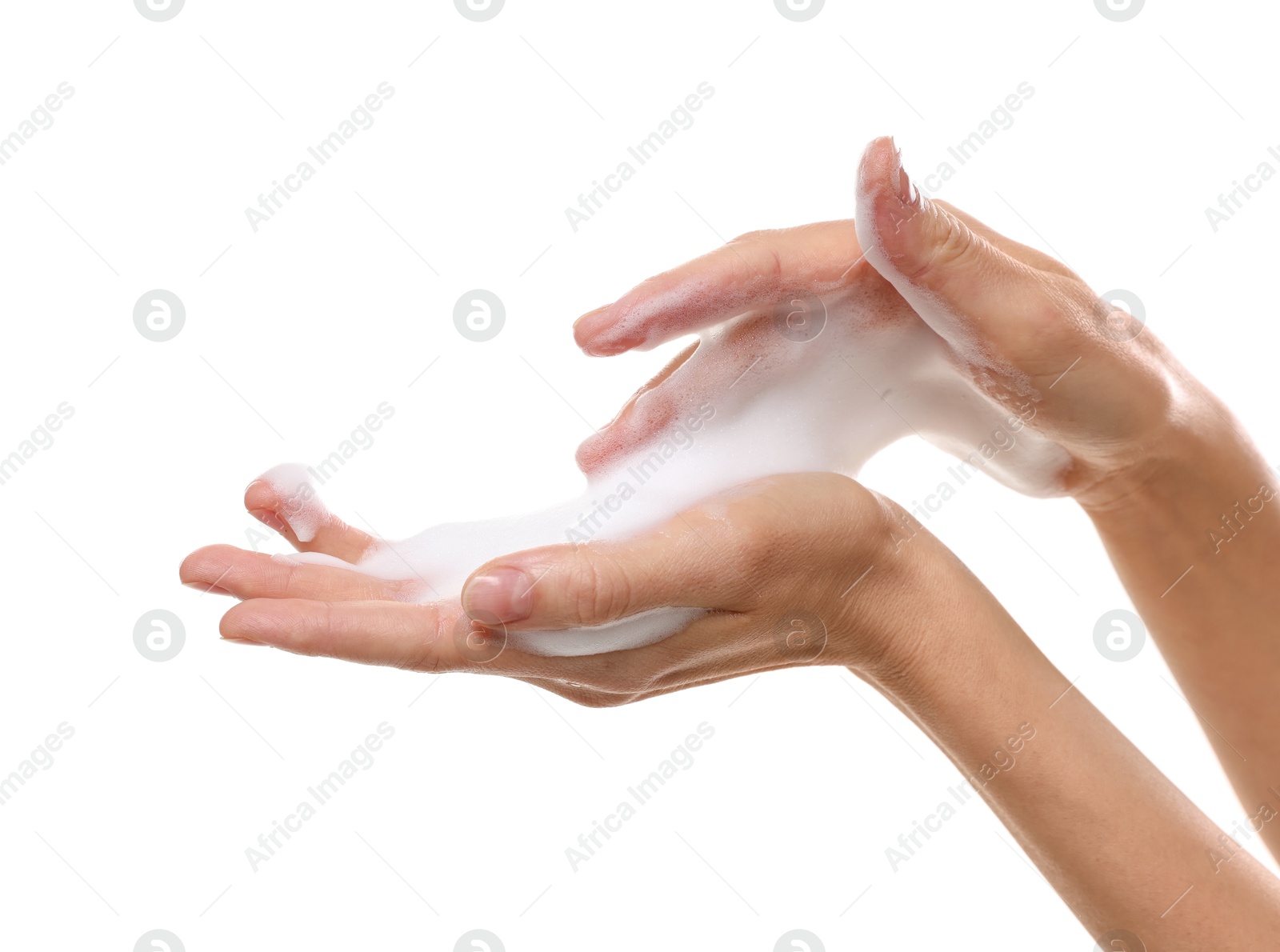 Photo of Woman washing hands with foaming soap on white background, closeup. Hygiene