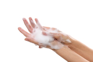 Photo of Woman washing hands with foaming soap on white background, closeup. Hygiene