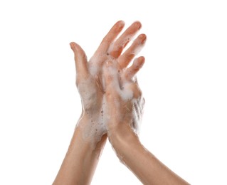 Photo of Woman washing hands with foaming soap on white background, closeup. Hygiene