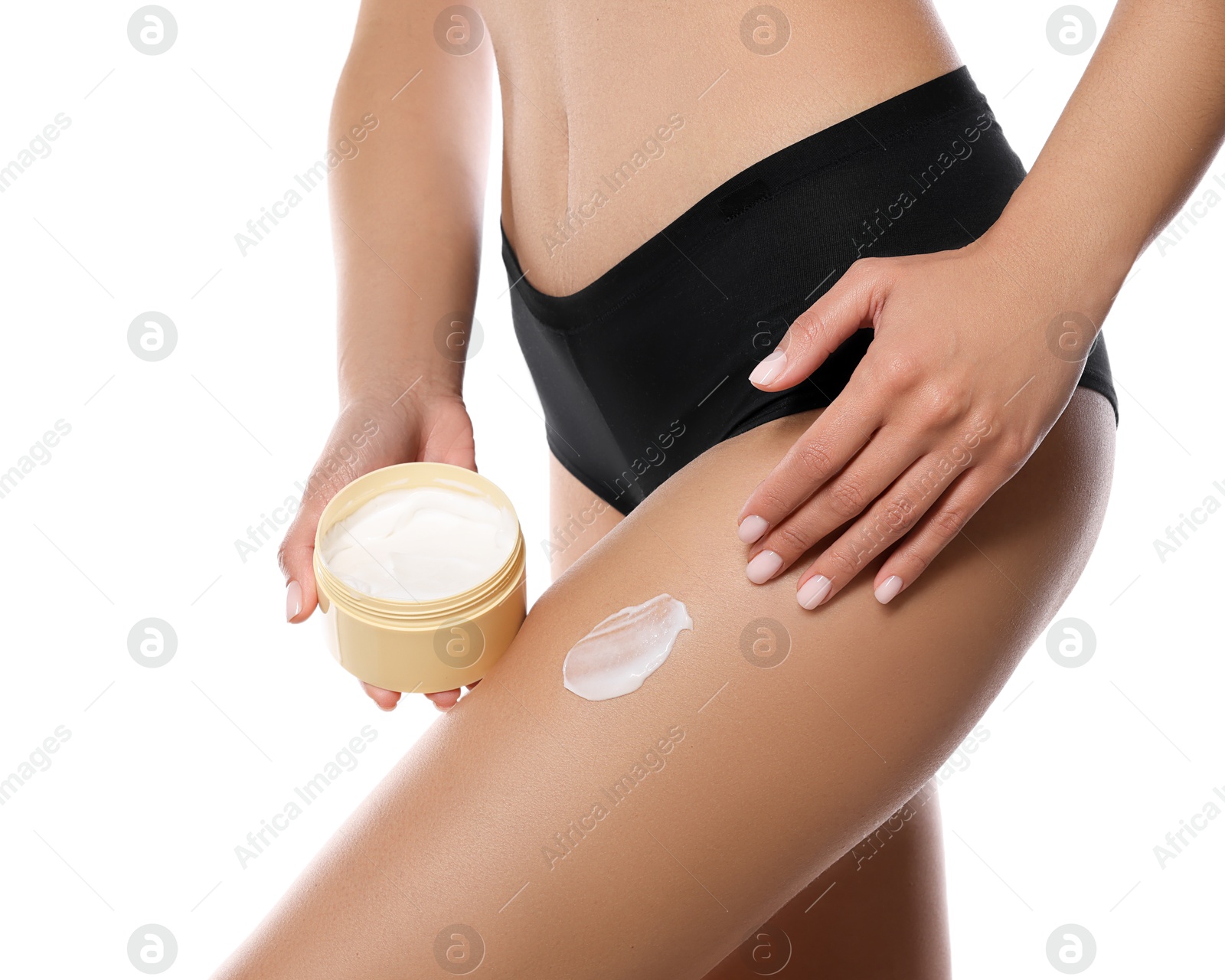 Photo of Woman applying anti cellulite cream on white background, closeup