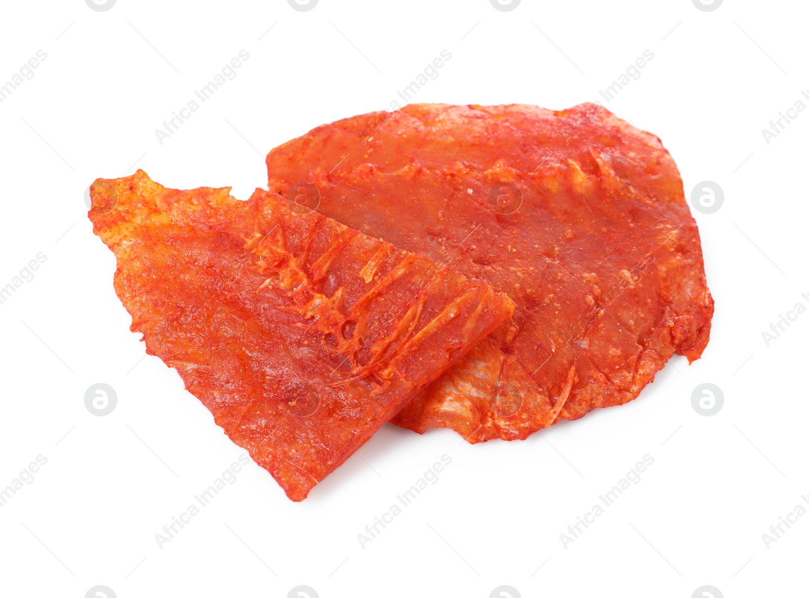 Photo of Dried spicy cod fillets isolated on white