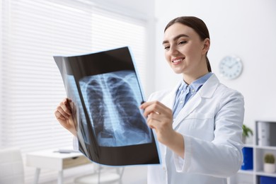 Doctor examining x-ray of lungs in hospital