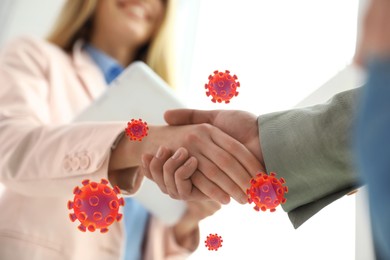 Image of Woman and man shaking hands, closeup. Illustration of viruses near handshake. Personal hygiene