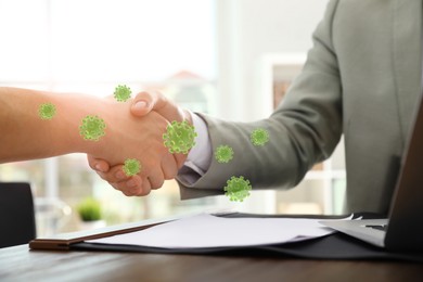 Image of Men shaking hands in office, closeup. Illustration of viruses near handshake. Personal hygiene