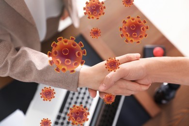 Image of Woman and man shaking hands in office, closeup. Illustration of viruses over handshake. Personal hygiene