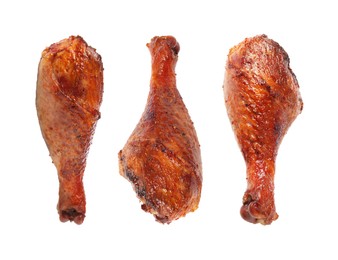 Image of Delicious turkey drumsticks on white background, set. Top view