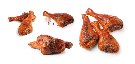 Image of Delicious turkey drumsticks on white background, set