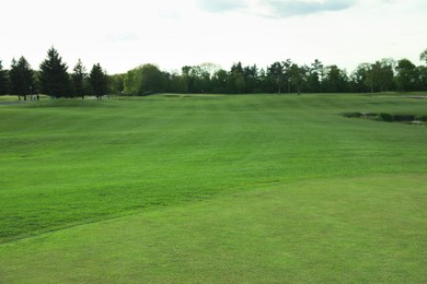 Photo of Beautiful view of golf course on sunny day