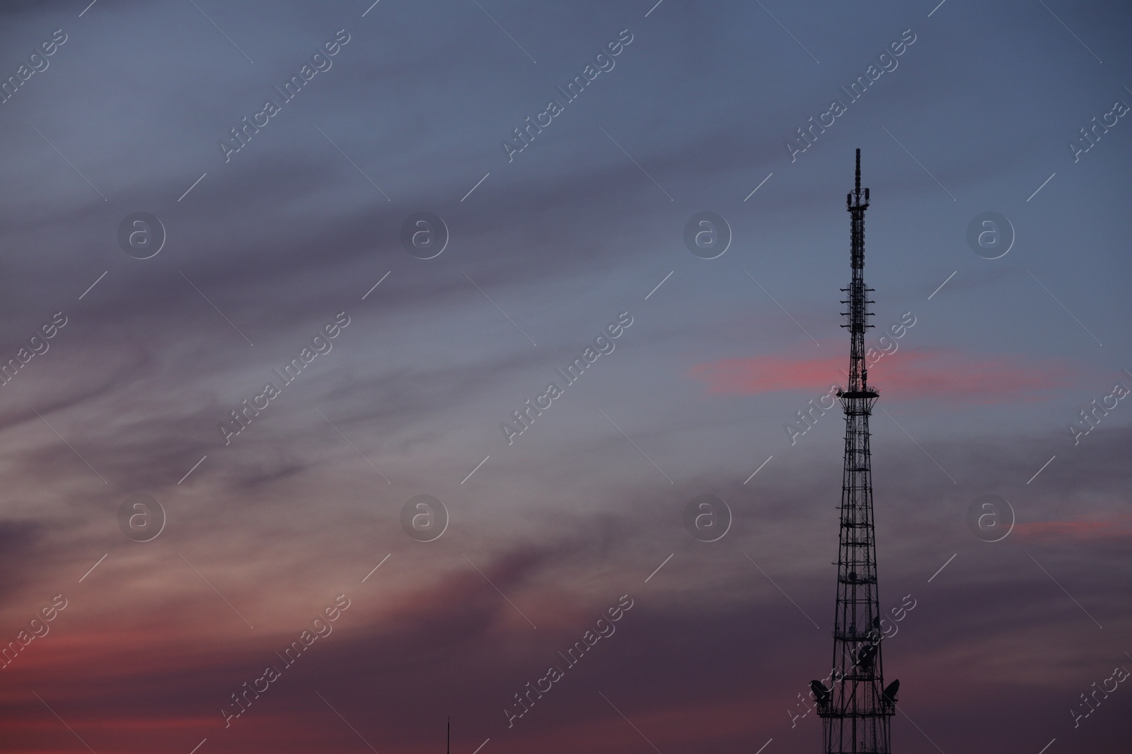 Photo of Transmission tower against beautiful sky at sunset