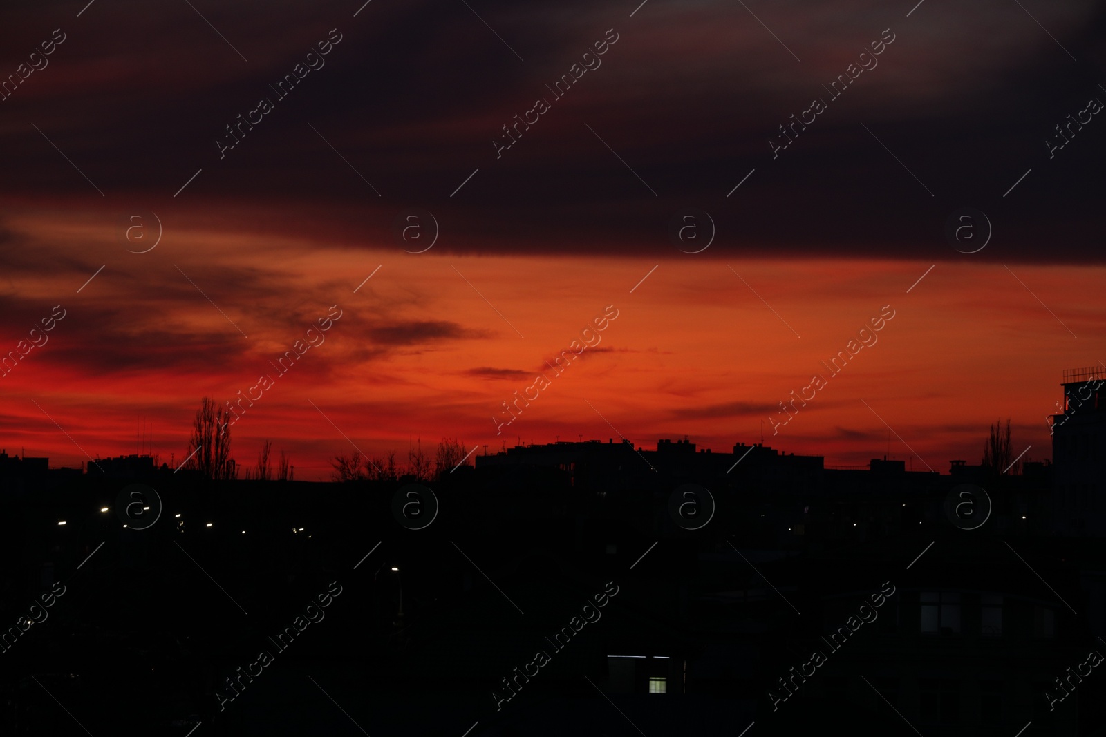 Photo of View of beautiful sky over city at sunset