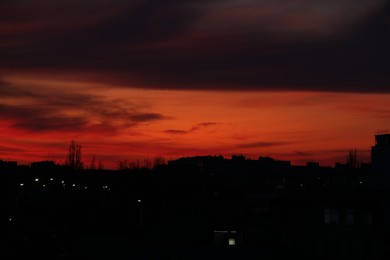 Photo of View of beautiful sky over city at sunset