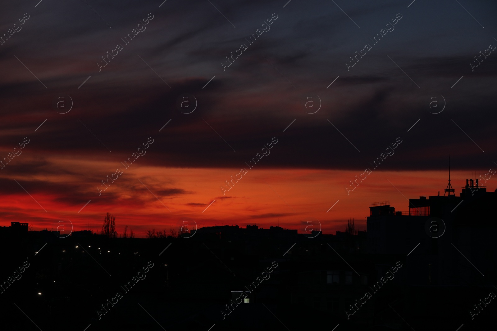 Photo of View of beautiful sky over city at sunset